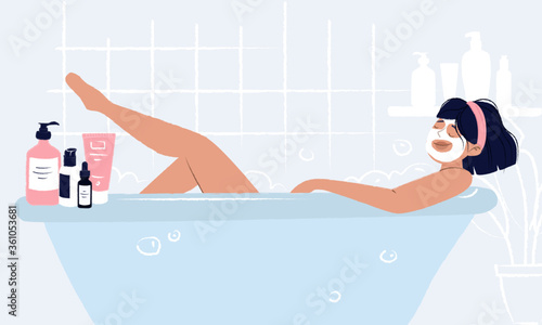 Young girl laying in bathtub with face mask doing hygiene and self care and enjoying her beauty ritual. Woman bathroom with cosmetics around: cream, mask, serum dropper bottle, hair spray and shower.