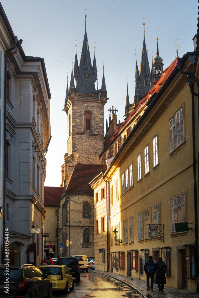 Fototapeta premium Old street in Prague. Church of Our Lady before Týn stepple