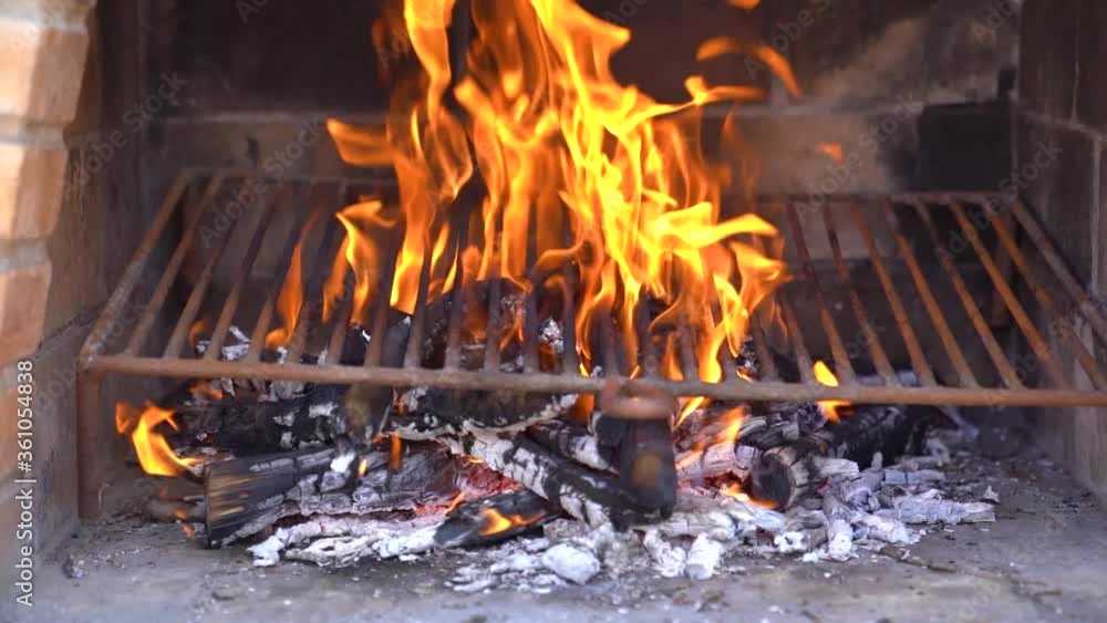 Fire flames in the barbecue. Slow motion Fire flames in the barbecue. Slow motion