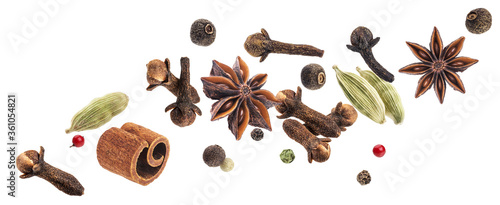 Aromatic spices collection, igredients for mulled wine isolated on white background © xamtiw