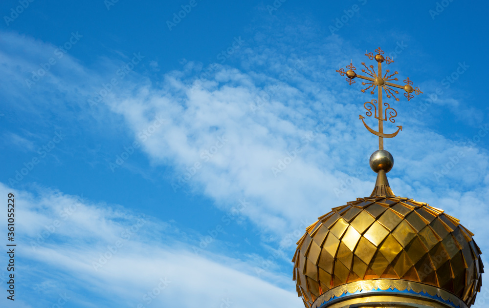  Horizontal blue background with a golden dome of the chapel. Blue sky for text. Copy space.