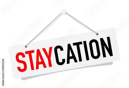 Staycation on hanging door sign