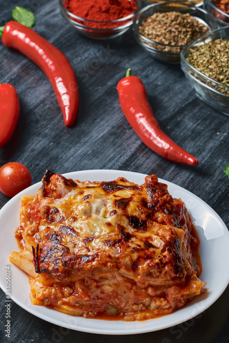 Traditional homemade lasagna and ingredients photo