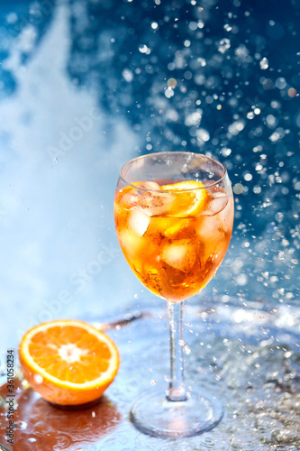 Summer alcoholic refreshing cocktail - Aperol spritz. Popular italian drink