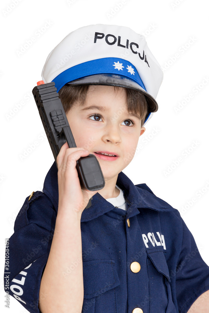 Boy age 6 boy pretending to be a police officer.