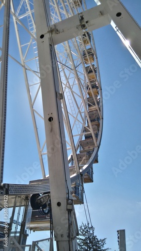 ferris wheel against blue sky
