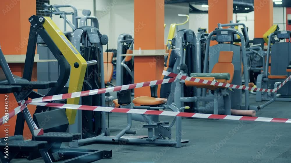 Fitness equipment blocked with a barricade tape Fitness equipment blocked with a barricade tape