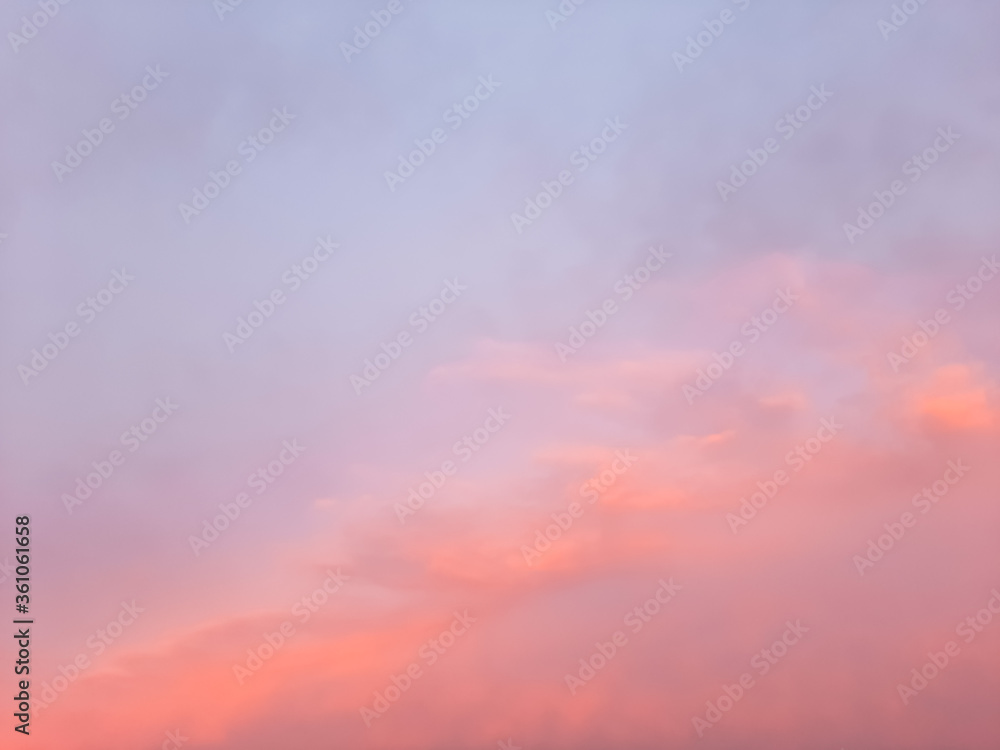 dreamy blurred sunset sky with pink and blue colors