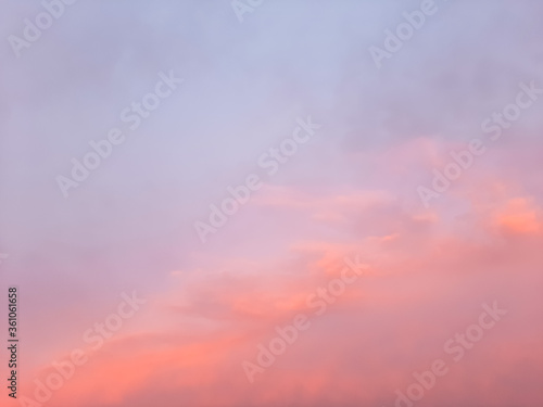 dreamy blurred sunset sky with pink and blue colors