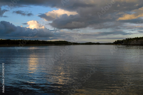 Karelian sunset seascape. Kandalaksha Gulf of White Sea, Republic of Karelia, Russia.