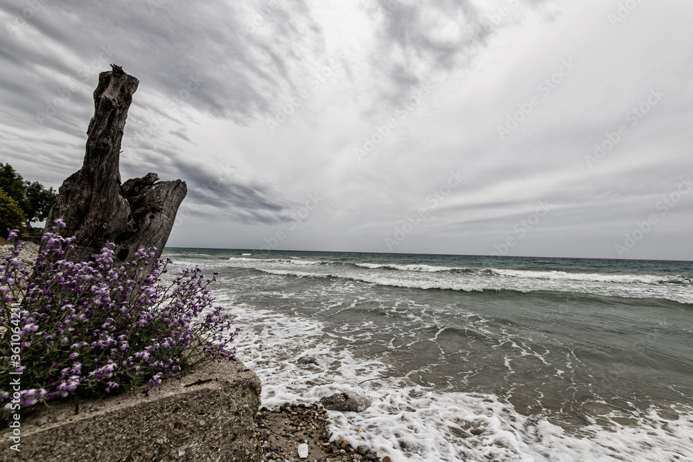 Gushing sea on a stormy summer day, a seen from a beach in Chalkidiki Greece Gushing sea on a stormy summer day, a seen from a beach in Chalkidiki Greece