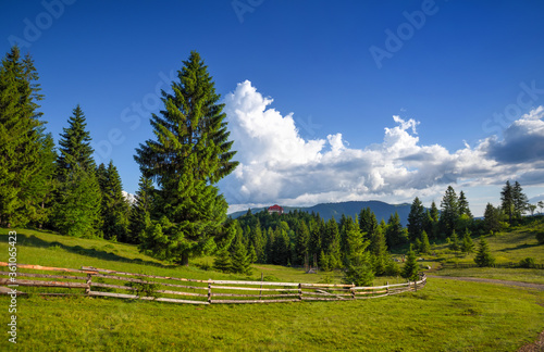 Summer landscape in mountains and blue sky with clouds