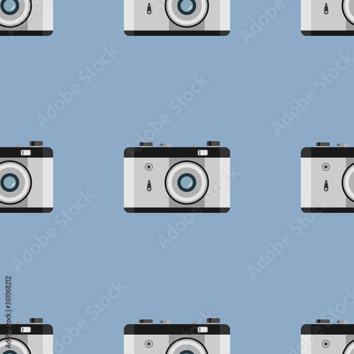 Flat retro light camera for photo on calm blue background. Seamless style business technology pattern.