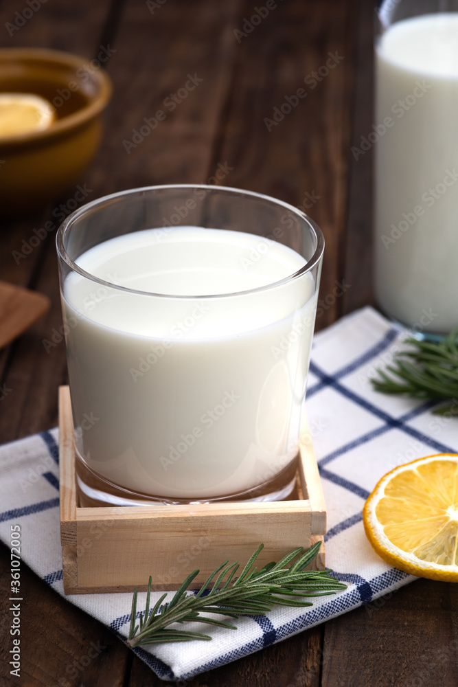 milk in glass on wood food background milk in glass on wood food background
