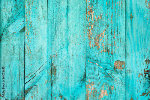 Weathered blue wooden background texture. Shabby wood teal or turquoise green painted. Vintage beach wood backdrop.