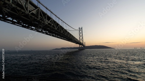 Akashi-Kaikyo Bridge during sunset © craigansibin