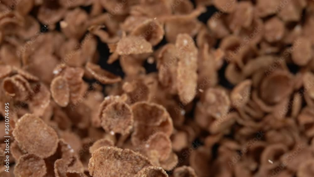Explosion of wheat flakes on a black background. Slow motion 250 fps Explosion of wheat flakes on a black background. Slow motion 250 fps