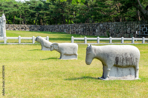 White stone carving sculpture of guardian animals at the Royal tomb of king Suro of Gaya kingdom in Gimehae, South Gyeongsang province, South Korea photo