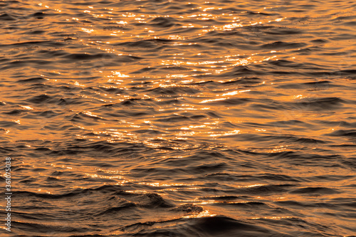 beautiful water ripple in the sea when sunset