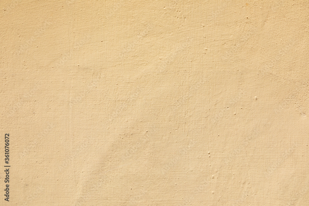detail of ocre harmonic painted plaster wall detail of ocre harmonic painted plaster wall
