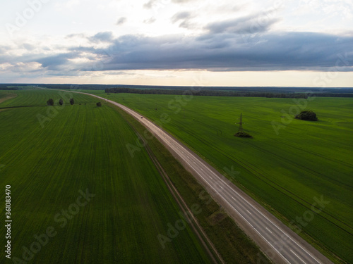 Top view of the road in summer evening. View from drone © olinchuk