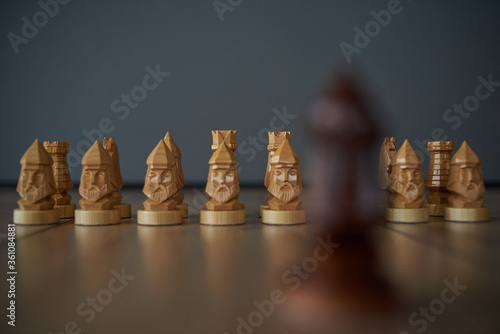 moving chess figure success play. Hand of player chess board game putting black pawn. wooden chess pieces. leader and success