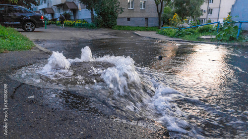 Having poured water supply systems in sewer well on road