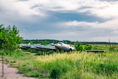 Old aircrafts "Aero L-29 Delfin" at abandoned Airbase aircraft cemetery in Vovchansk, Kharkov region, Ukraine.