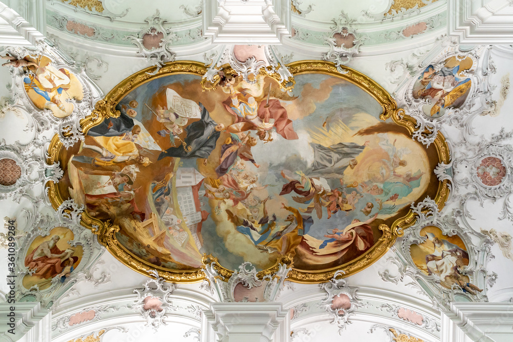 interior view of the intricate ceiling murals in the St. Georg and Jakobus church in Isny in southern Germany