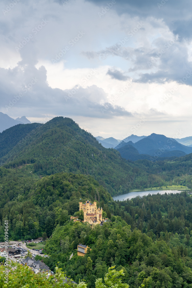 view of the southern Bavarian Alps with the Hohenschwangau Castle and Schwansee