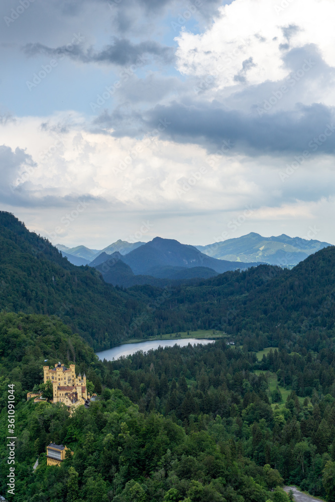 view of the southern Bavarian Alps with the Hohenschwangau Castle and Schwansee