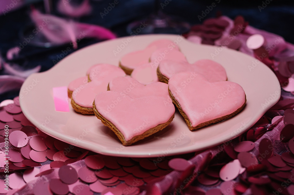 The pink heart shaped ginger cookies for Valentine's day The pink heart shaped ginger cookies for Valentine's day