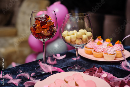 Table with jelly bears and different sweets for party. Candy bar.