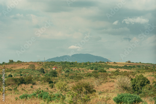 Fototapeta Naklejka Na Ścianę i Meble -  A view of hills and valleys with cloudy sky in Morogoro tanzania