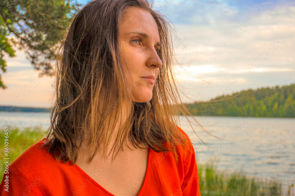 beautiful woman in red dress by lake
beautiful woman in red dress by lake