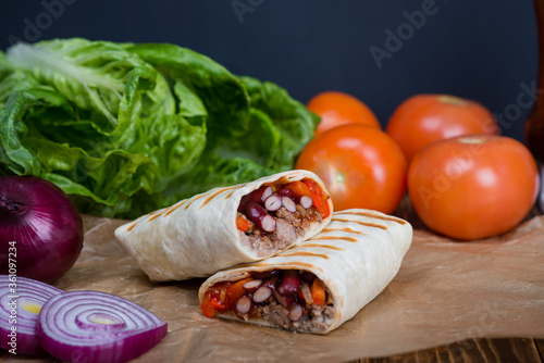 Traditional Mexican food, burritos with beans and vegetables