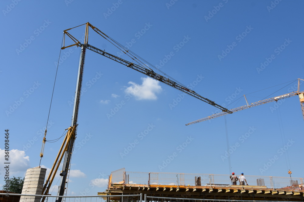 Scene of crane at building construction site architecture apartments backgrounds.