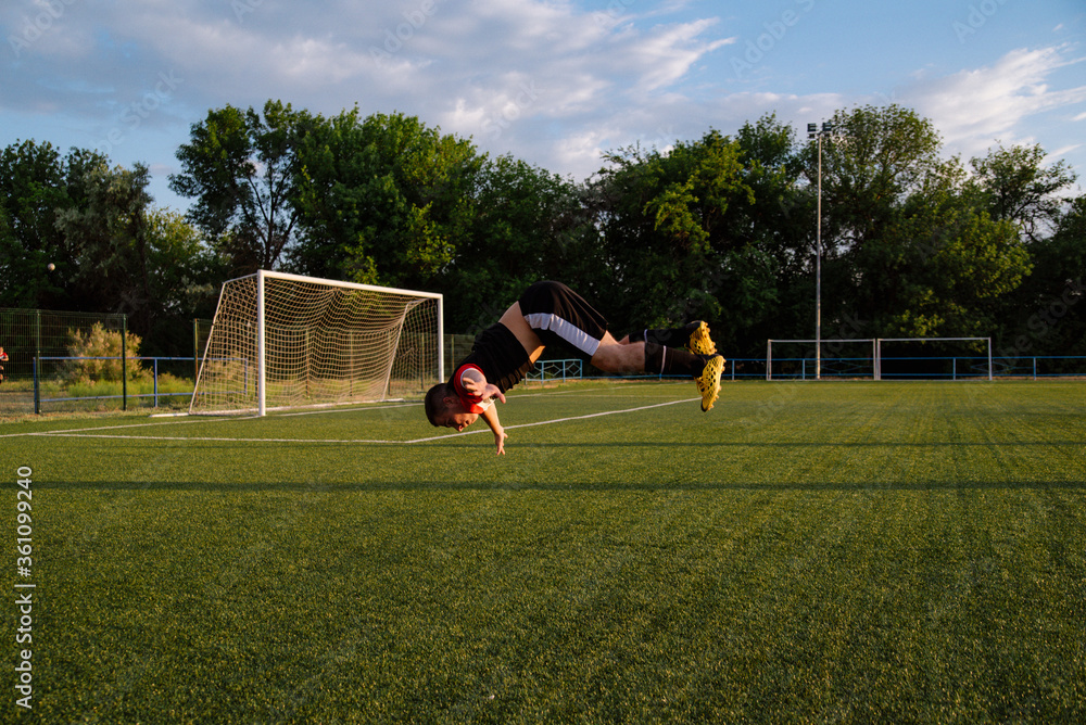 soccer player celebrating goal on a soccer stadium.Soccer player does a