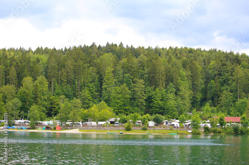 Camp site at a lake and forest (Walchensee, Bavaria, Germany) photo