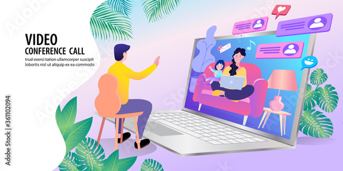 Father at home with tablet, video chatting with his family. 