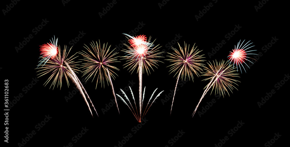 Beautiful fireworks display on black sky. New year celebration concept..