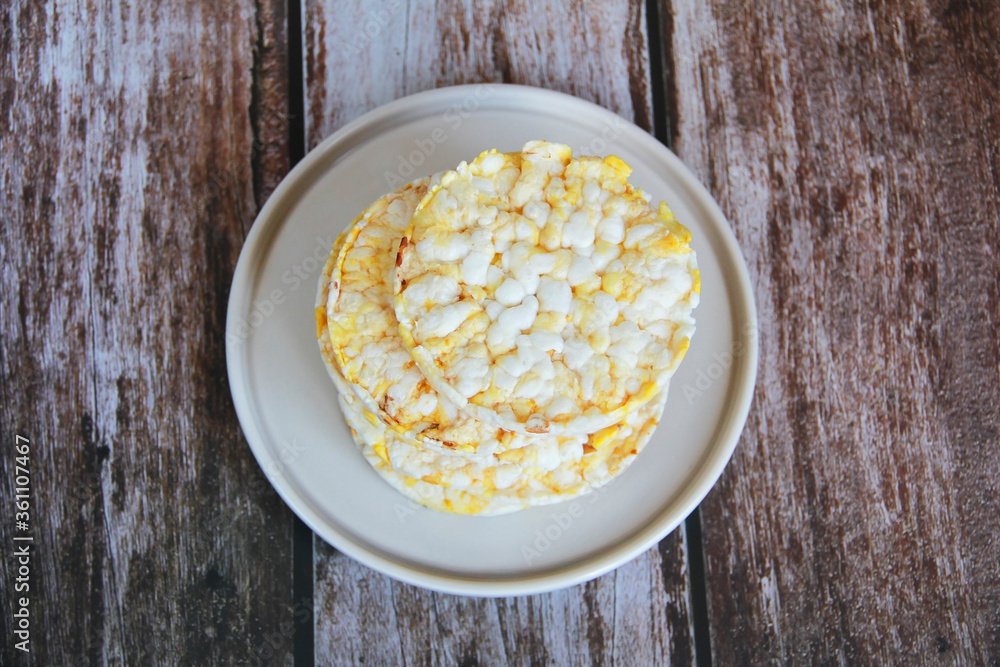 dry cookies from air rice and corn on a decorative plate dry cookies from air rice and corn on a decorative plate
