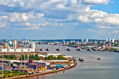 Thames flood barrier on the river in Greenwich East London England UK