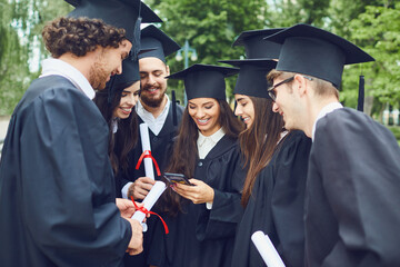 A group of graduates smiling