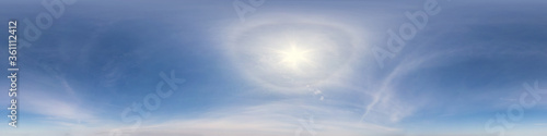 clear blue sky with halo sun. Seamless hdri panorama 360 degrees angle view with zenith for use in 3d graphics or game development as sky dome or edit drone shot