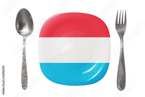 Fototapeta Naklejka Na Ścianę i Meble -  Plate with the Luxembourg flag. An empty plate with a spoon and fork on a white background. Isolated image
