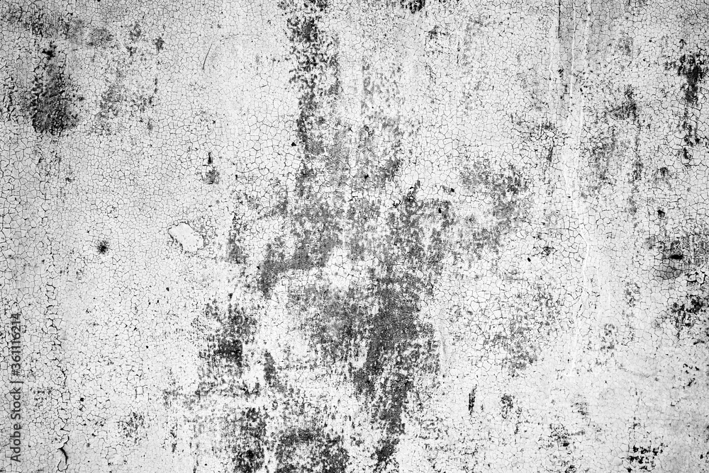 Metal texture with scratches and cracks which can be used as a background Metal texture with scratches and cracks which can be used as a background