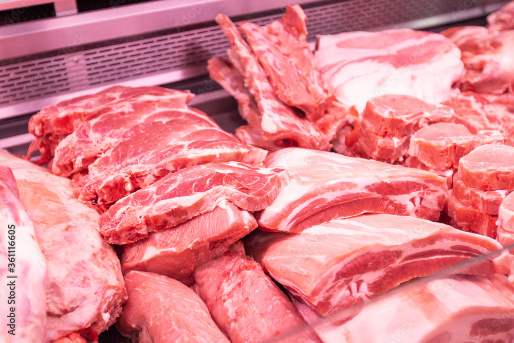 Close up of meat in a supermarket. Raw meat at butcher shop