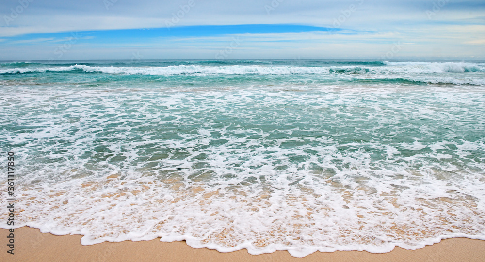 waves sea and yellow sand