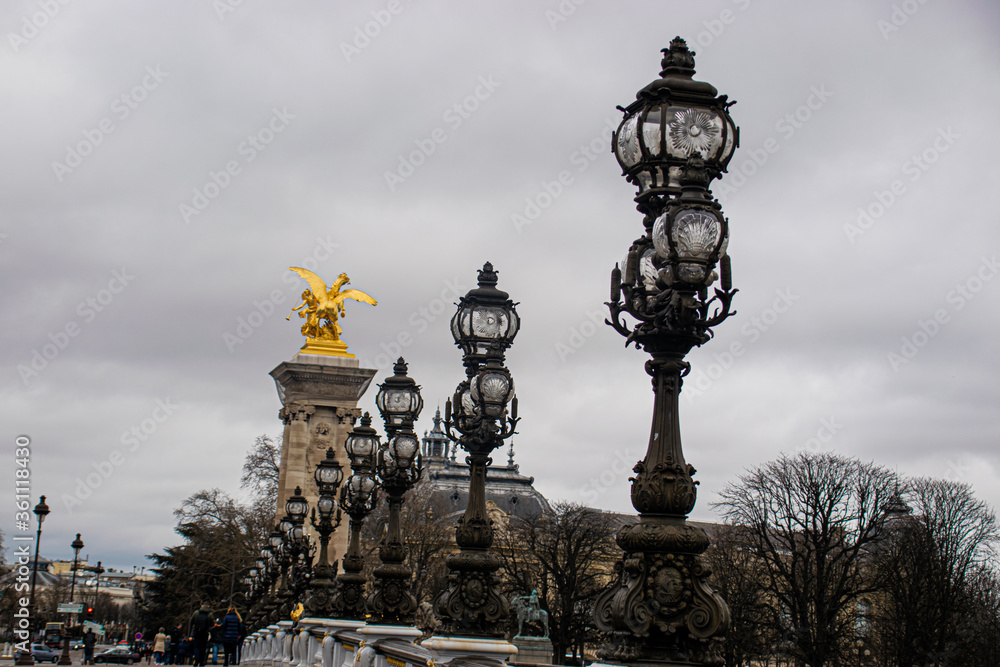 Photo of Alexander III bridge in Paris during a cloudy day Photo of Alexander III bridge in Paris during a cloudy day
